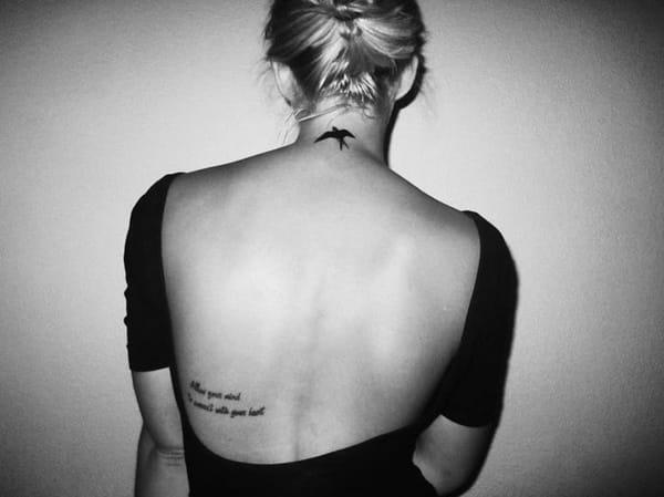 Tattoo At The Back Of The Neck