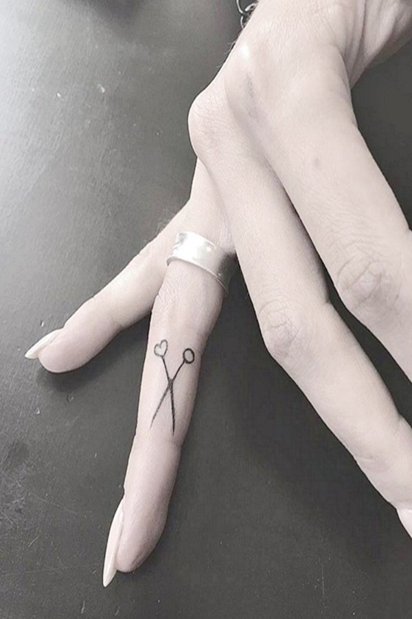 40 Tiny Yet Meaningful Finger Tattoo Ideas