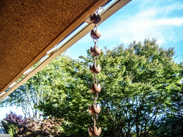 30 Decorative Rain Chain Ideas for Outdoors 15